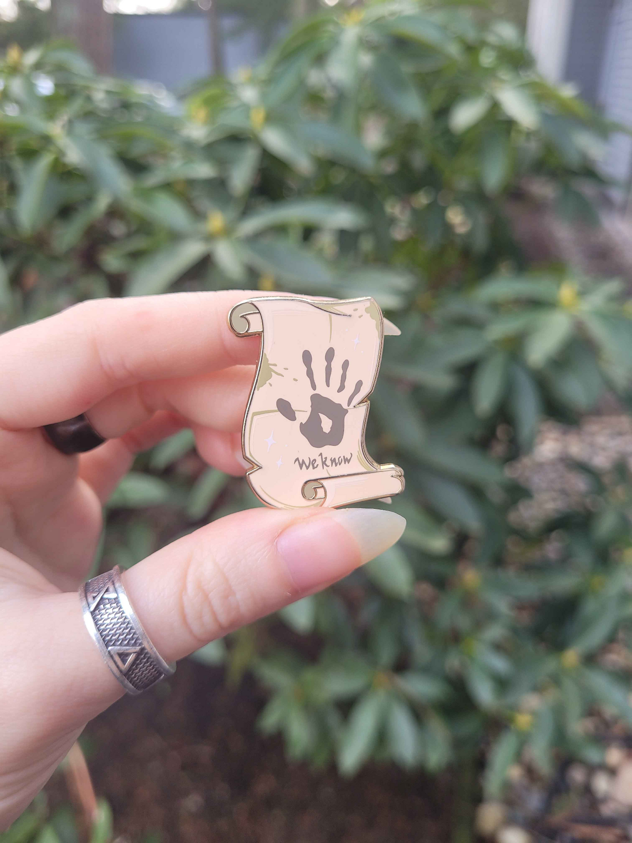 "We Know" Enamel Pin